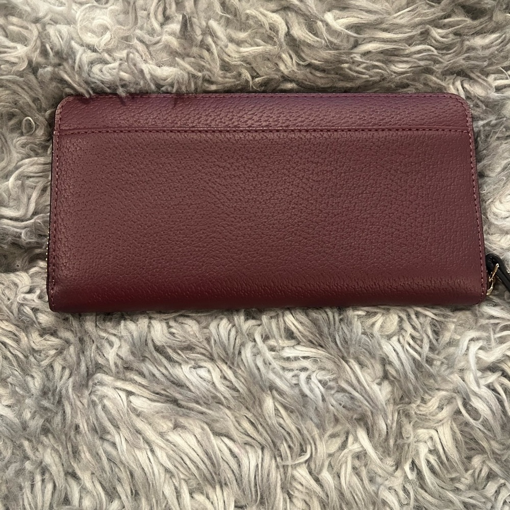 kate spade Burgundy Leather Zip-Around Wallet with Gold Logo - Picture 2 of 4